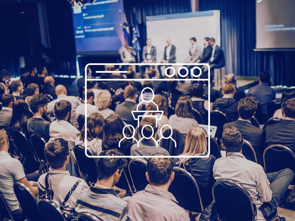 An abstract image of a conference taking place