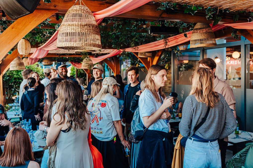 People gathered at the networking event at 'Acast Amrs'