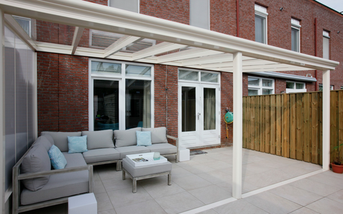 Pigato Glass roof veranda with one side polycarbonate wall.