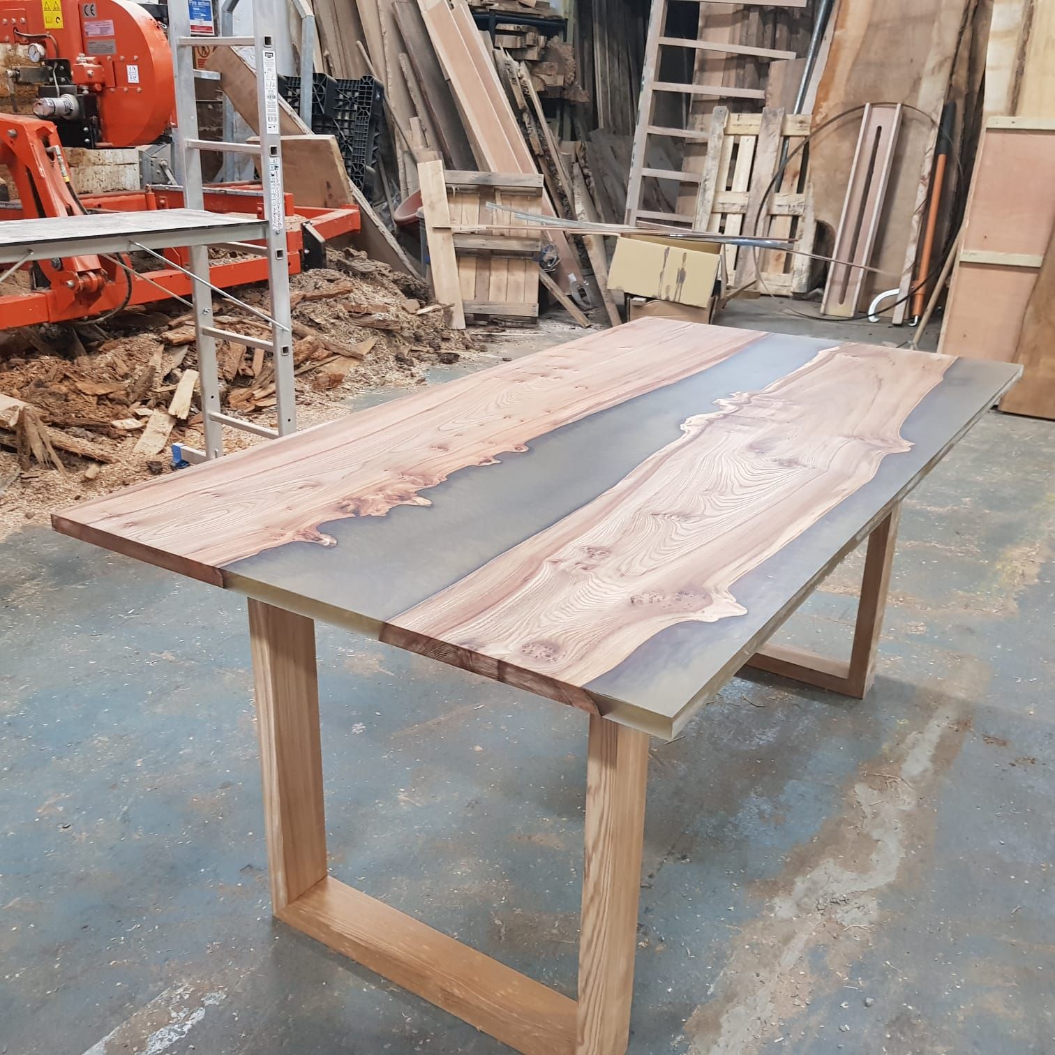 Hardwood and resin dining table