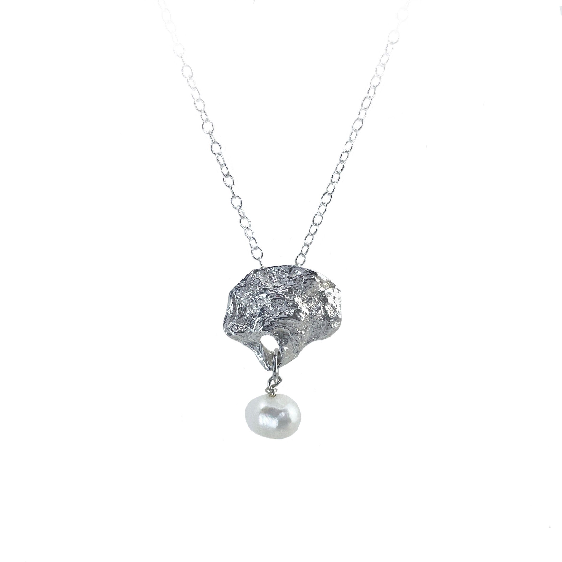 Silver oyster shell and pearl necklace