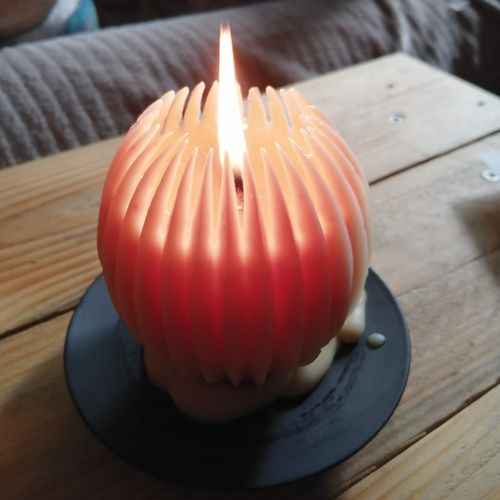 Segmented sphere pure beeswax candle