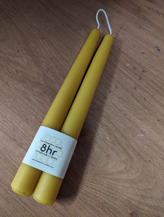 Coloured beeswax candles hand dipped in mid Wales