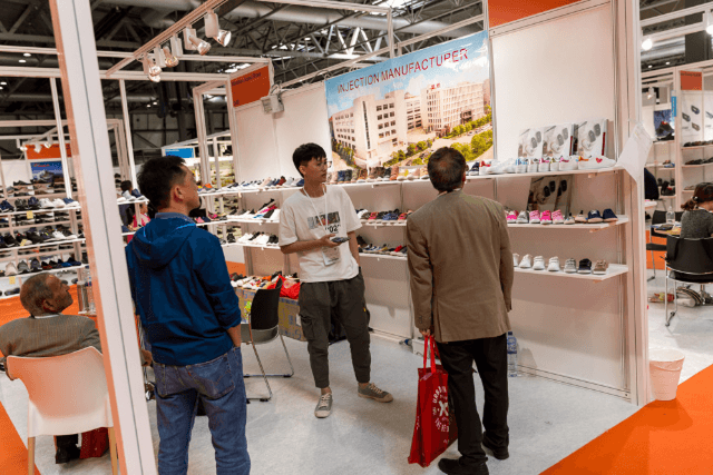 People networking at a trade show