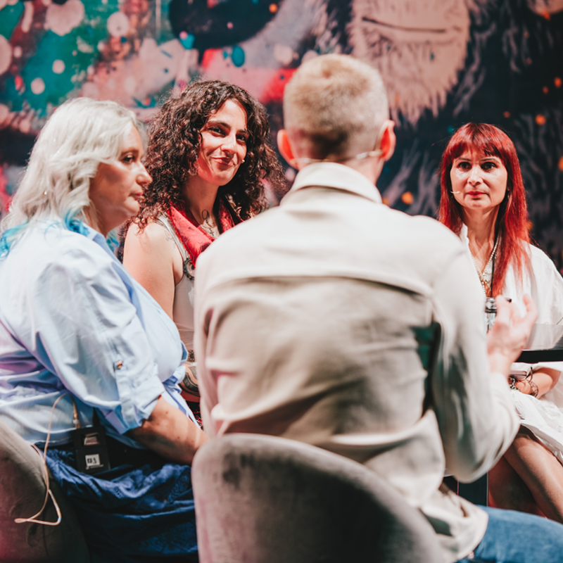 Visitors talking at Source Fashion