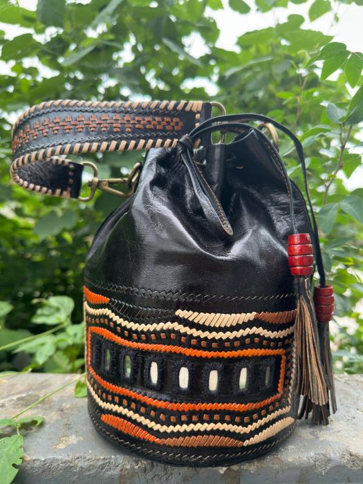 leather bags and Handwoven home linen