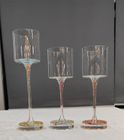 Glass candle holder with flower inside