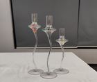 Glass candle holder with flower inside