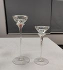 Glass candle holder with flower inside