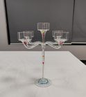 Glass candle holder with flower inside