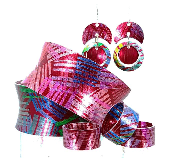 Ruby red bangles, earrings, and rings.