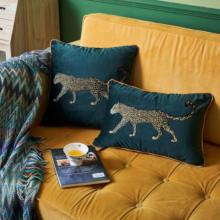 Velvet cushions with leopard embroidery