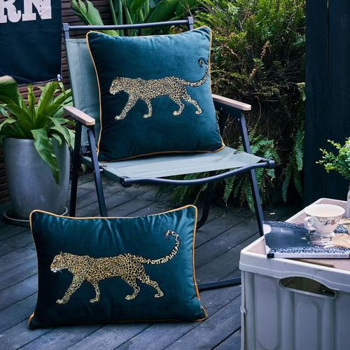 Velvet cushions with leopard embroidery