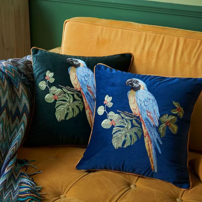 Velvet cushions with parrot embroidery