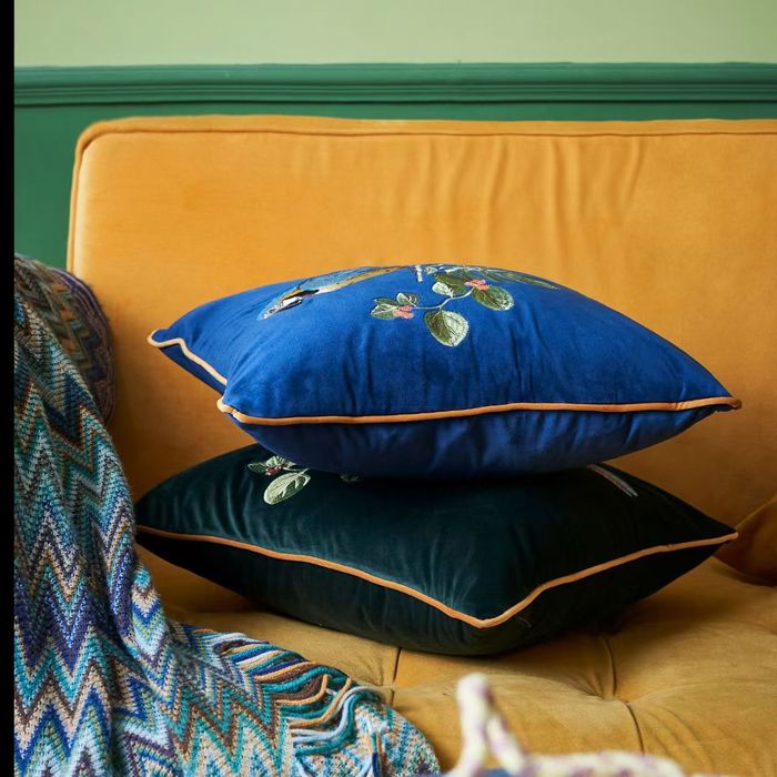 Velvet cushions with parrot embroidery