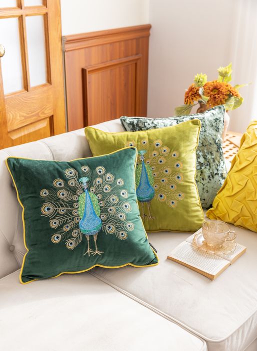 Set of  cushions with combination of handcrafted emboss, embeoridery, and iced details.