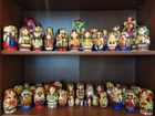 Nesting dolls with Ukrainian or winter designs