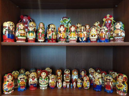 Nesting dolls with Ukrainian or winter designs