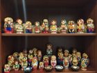 Nesting dolls with Ukrainian or winter designs