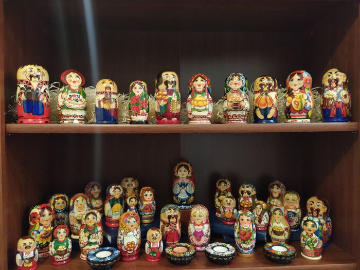 Nesting dolls with Ukrainian or winter designs