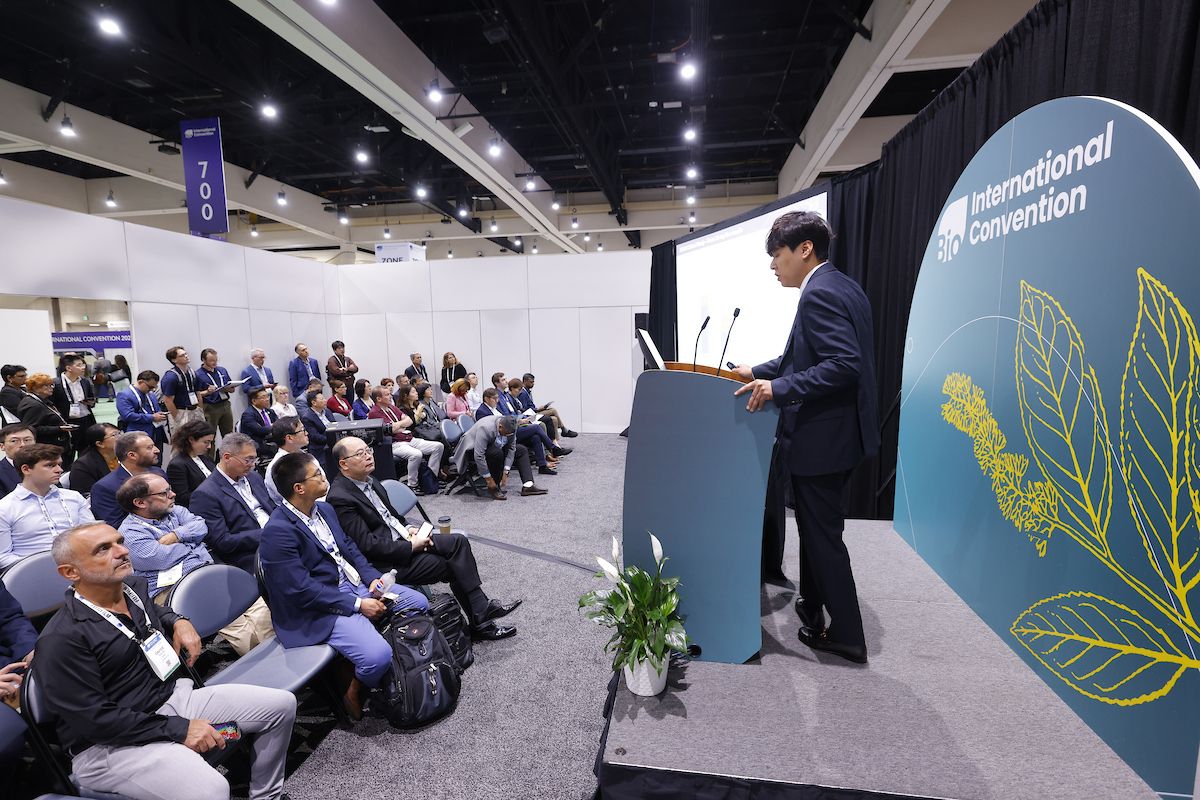 man speaking on stage