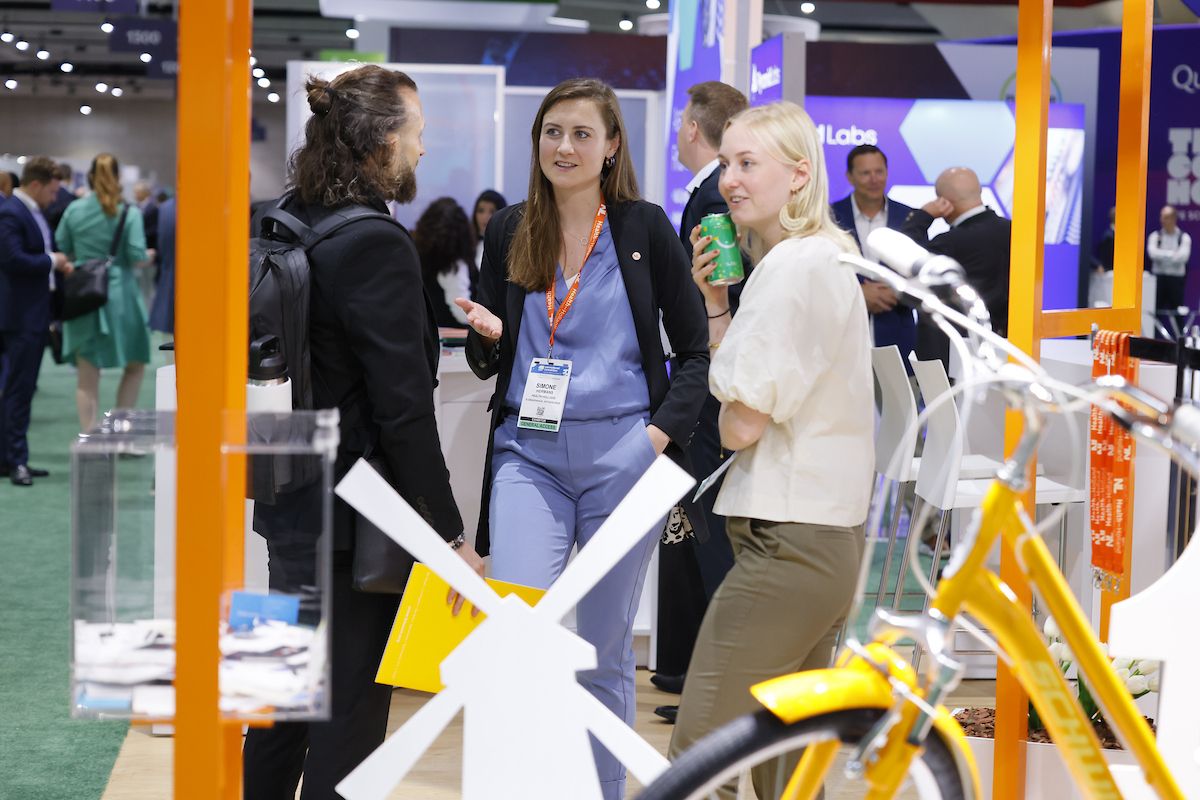 women in an exhibit booth