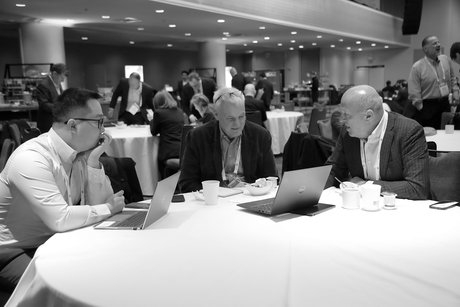 3 men at a business meeting