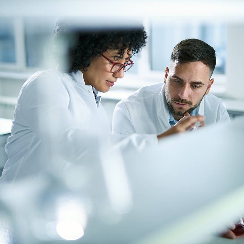 2 people in a laboratory setting