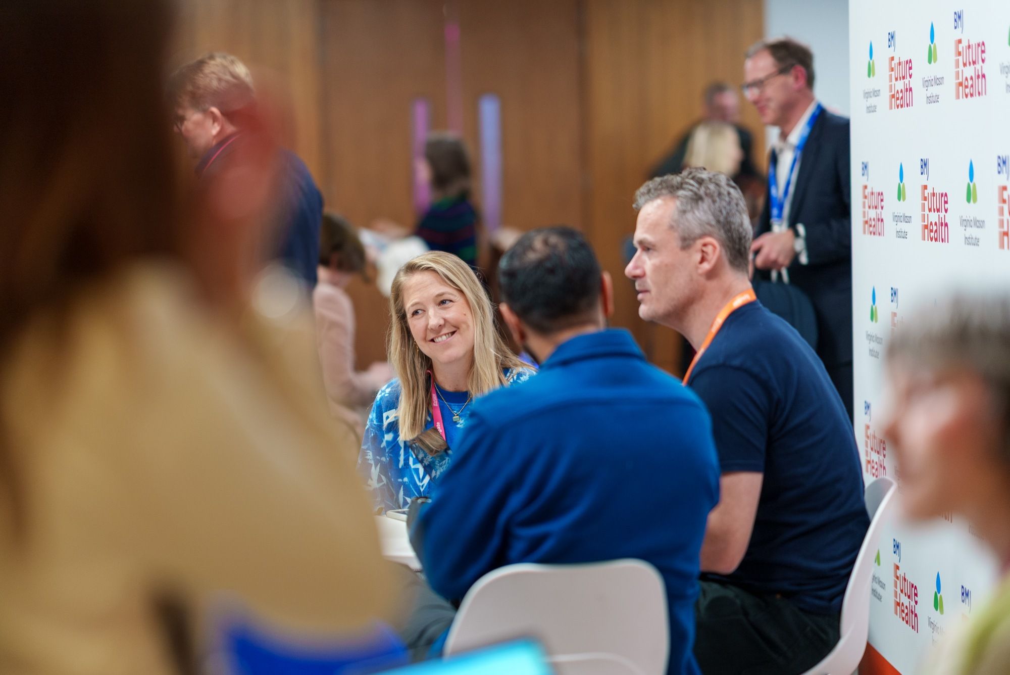 People taking a selfie at a conference
