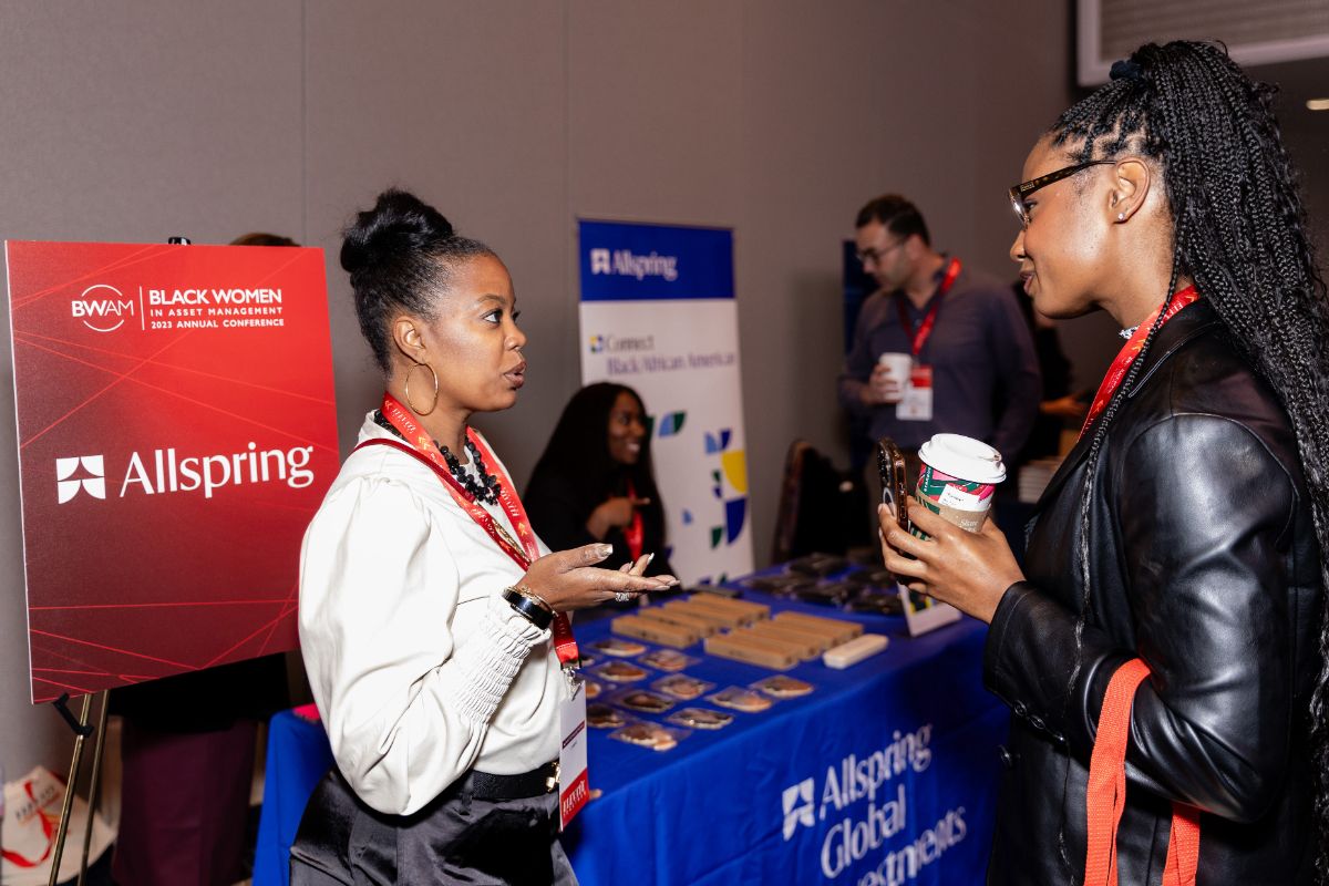 Sponsor chatting with delegate