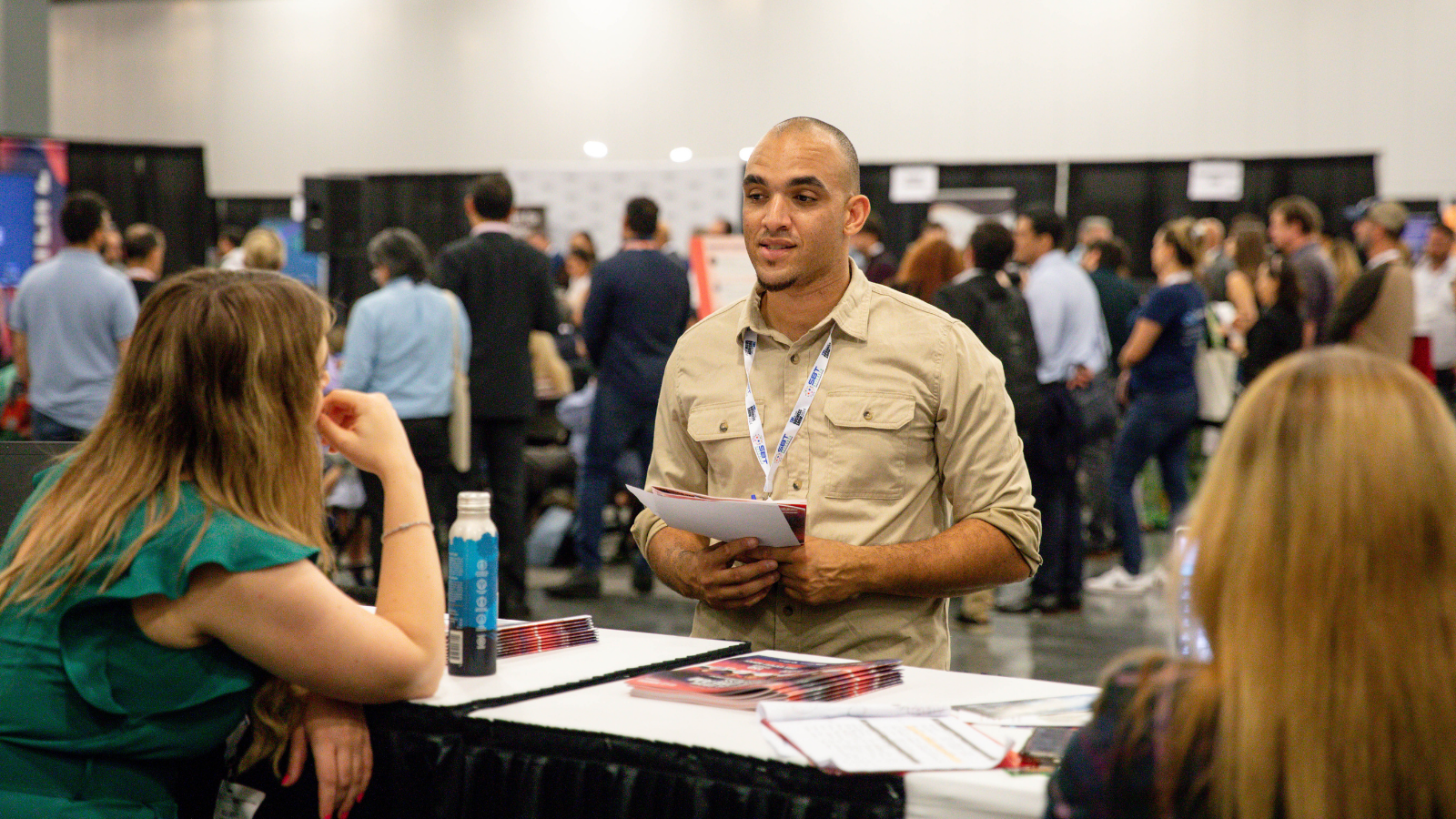 Attendees networking and discussing business opportunities at B2B Marketing Expo US 2026 event floor