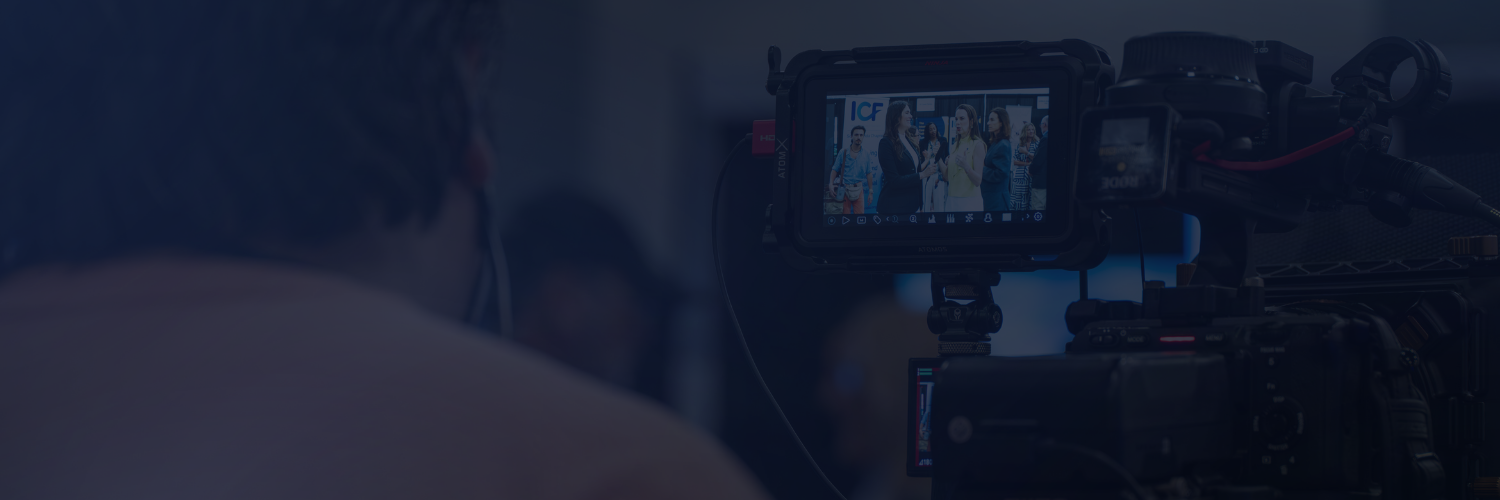 An image of a photographer filming a keynote speech at the Business Show Amsterdam