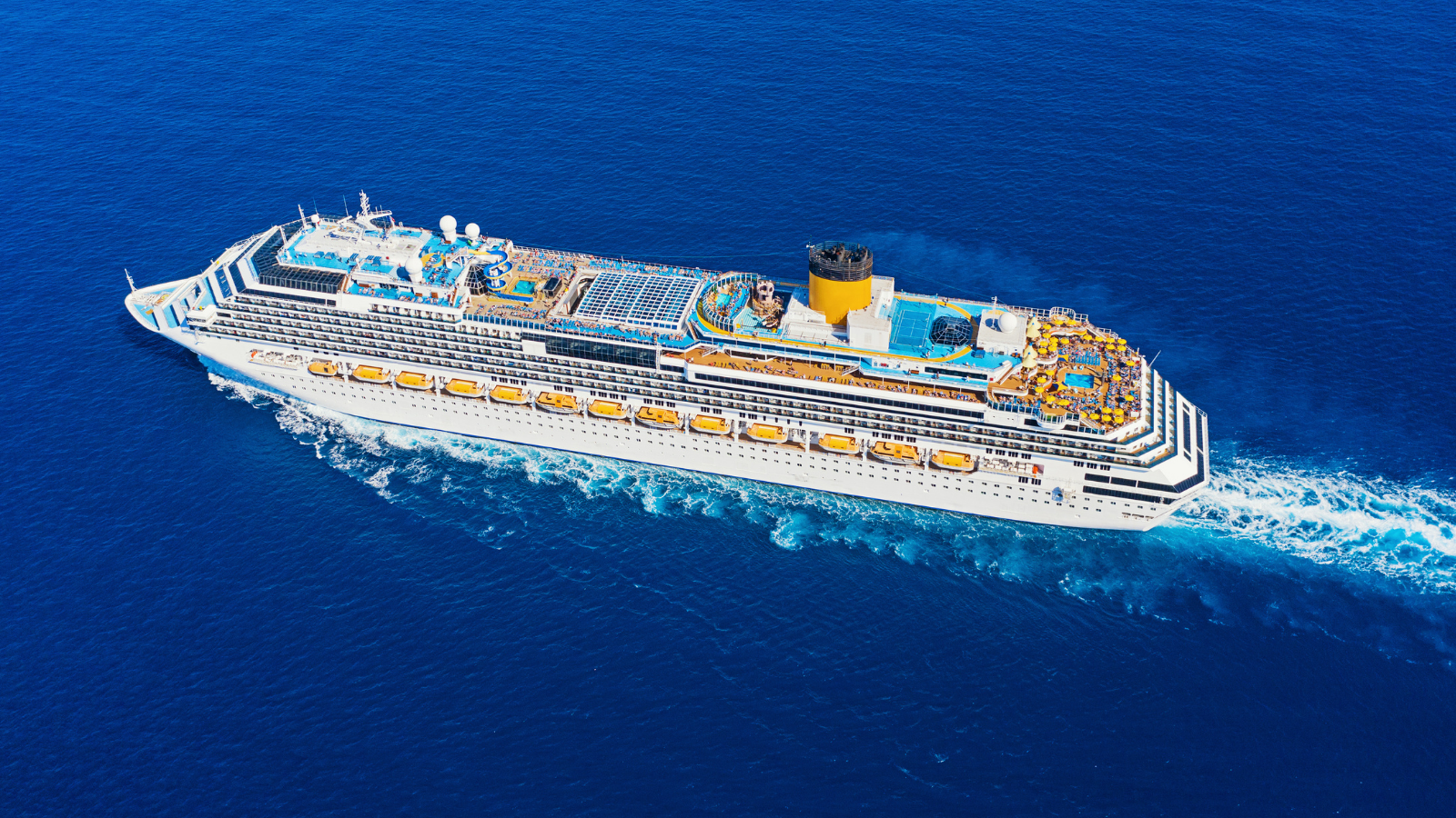 An aerial view of a cruise ship in the ocean