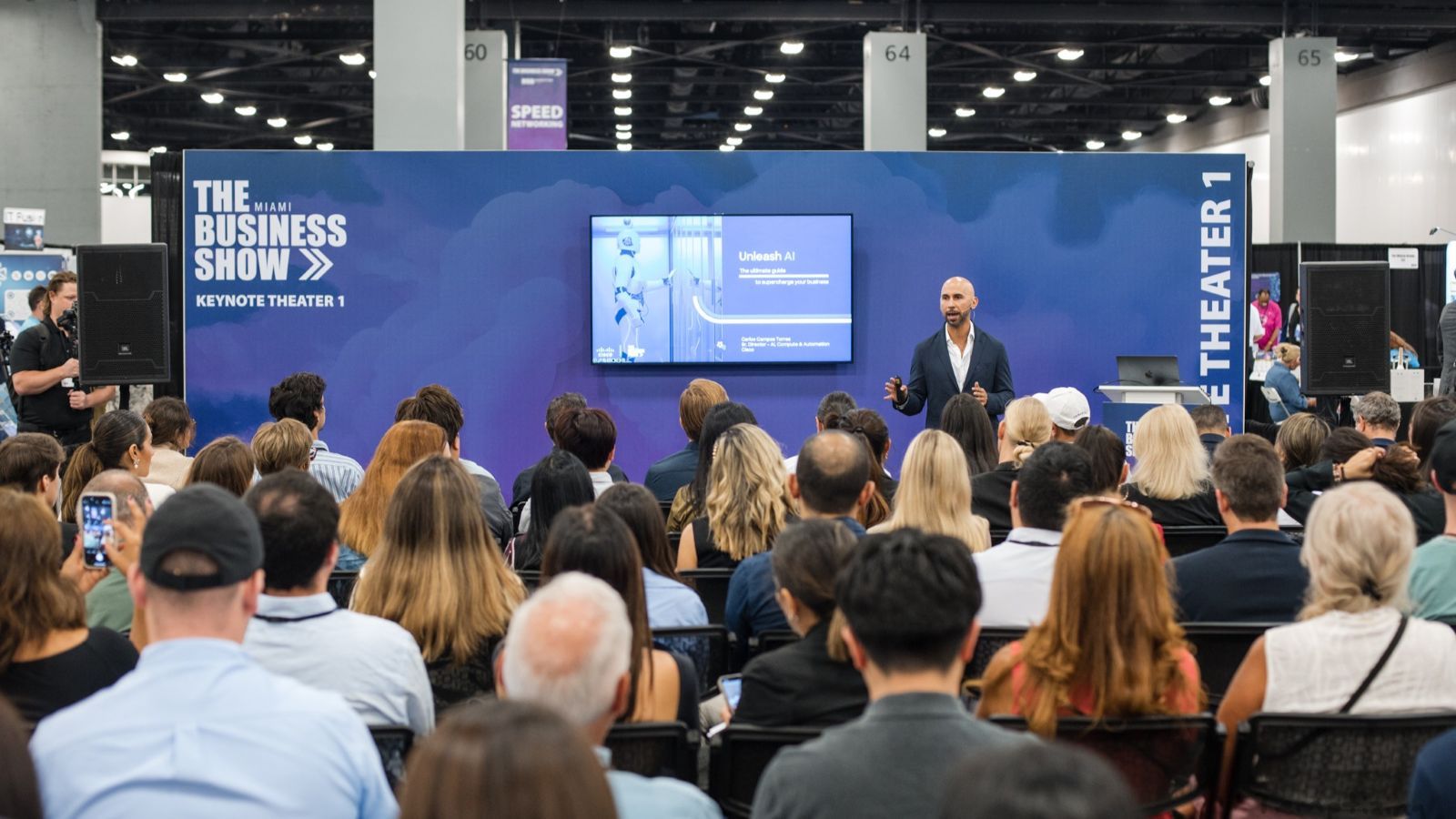 A picture of somebody giving a keynote speech at The Business Show Miami, the largest B2B trade show in the US