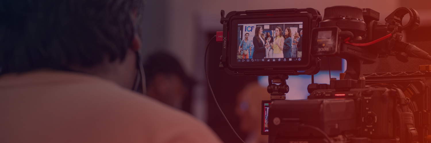 An image of a photographer filming a keynote speech at the Business Show Amsterdam