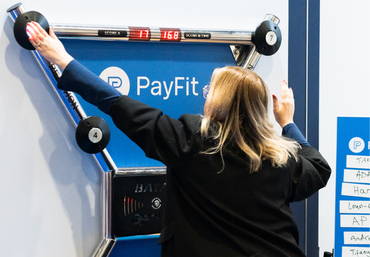 Attendees interacts with a game at The Business Show