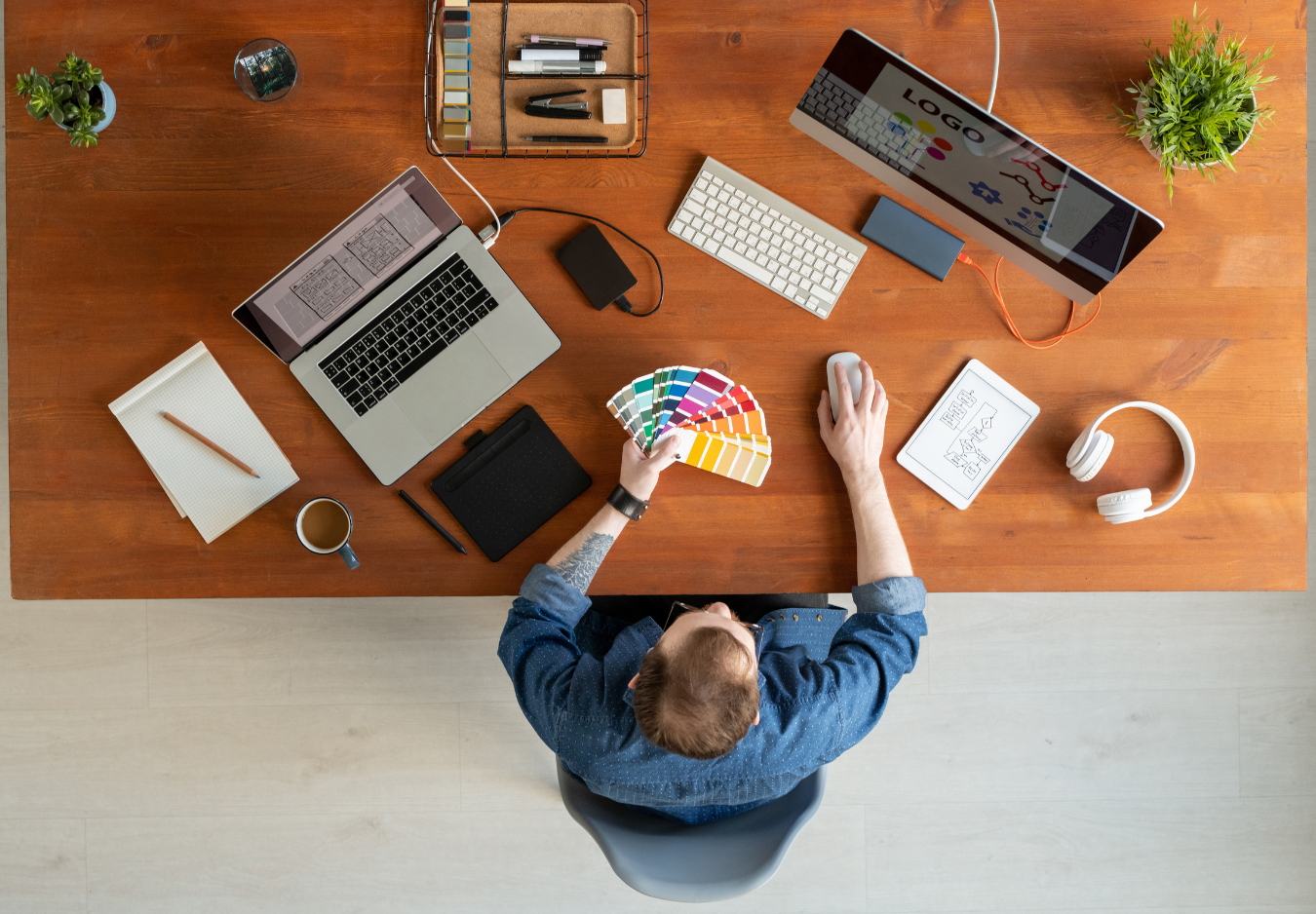 Image of man working on his brand identity at his desk