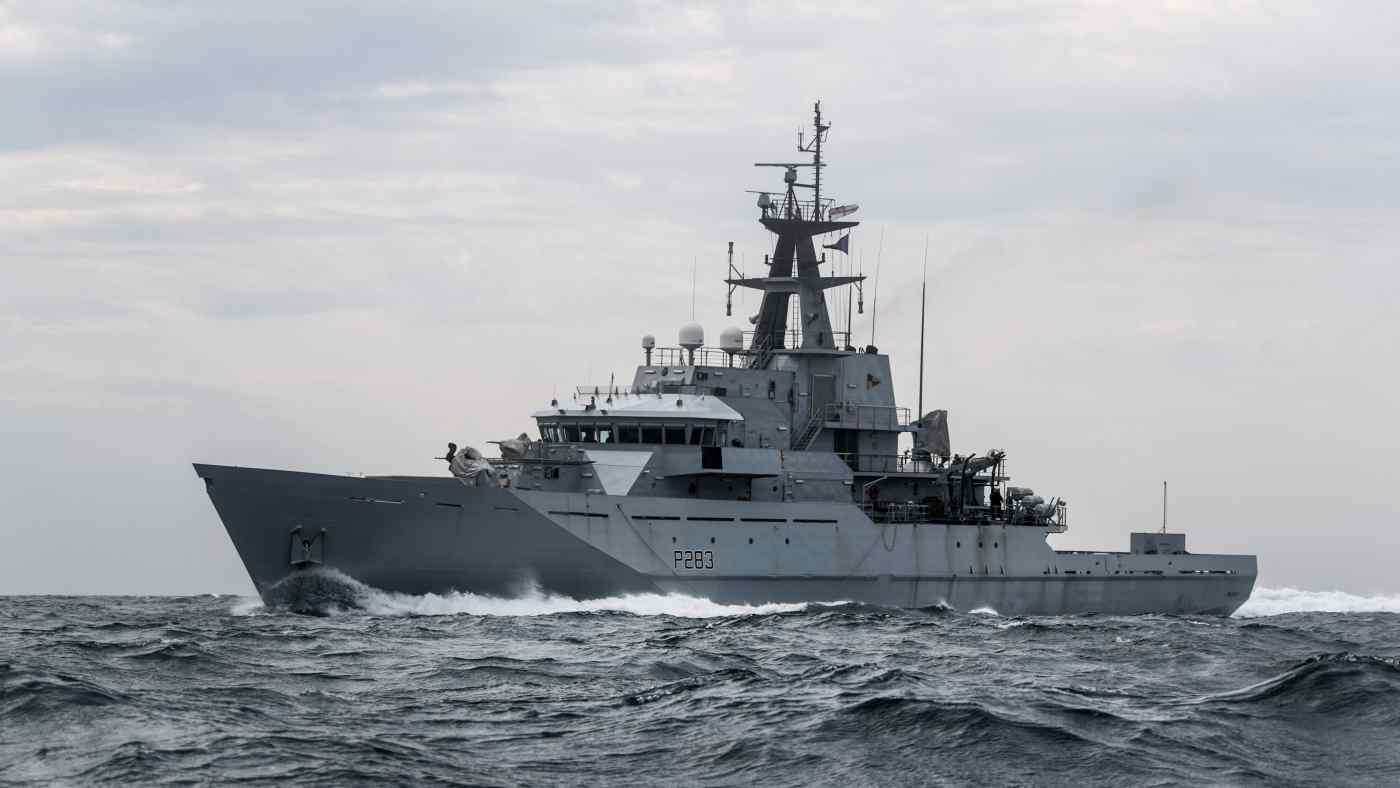 Britain to permanently deploy two warships in Asian waters | Reuters