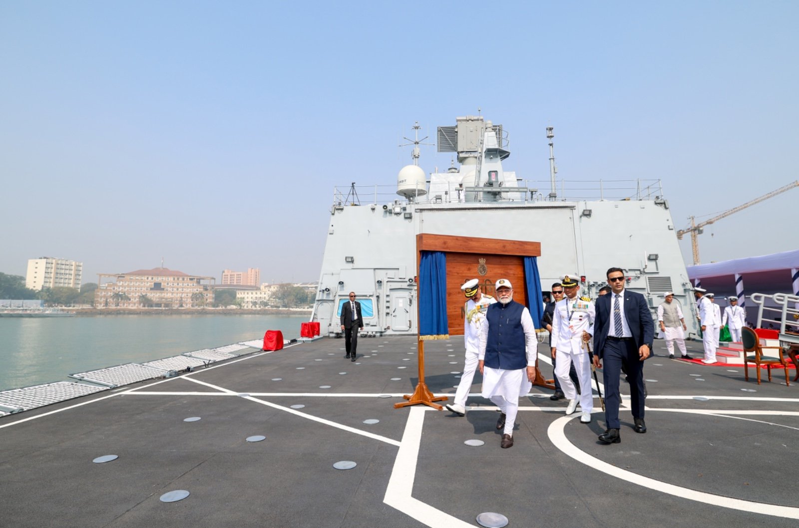 India unveils trio of new warships in naval push