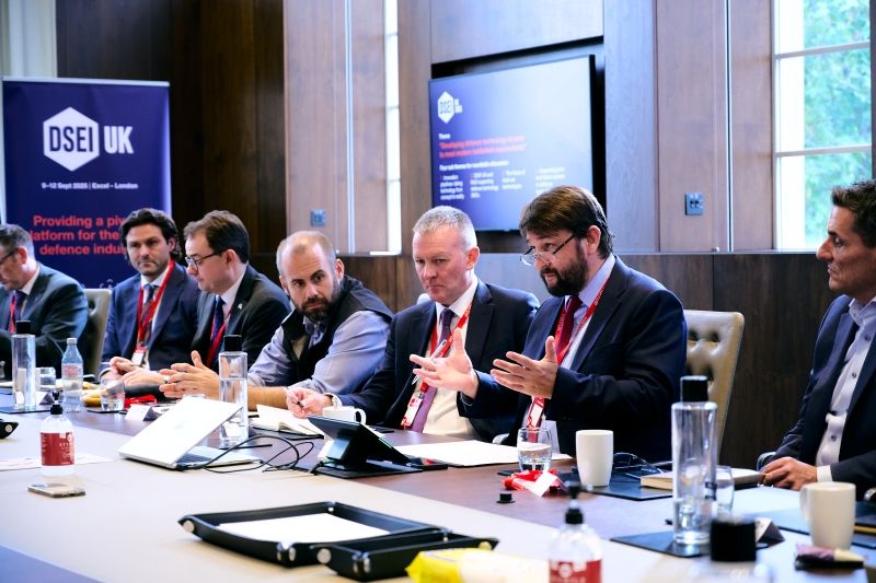 Company representatives and moderator gathered at DSEI UK roundtable.