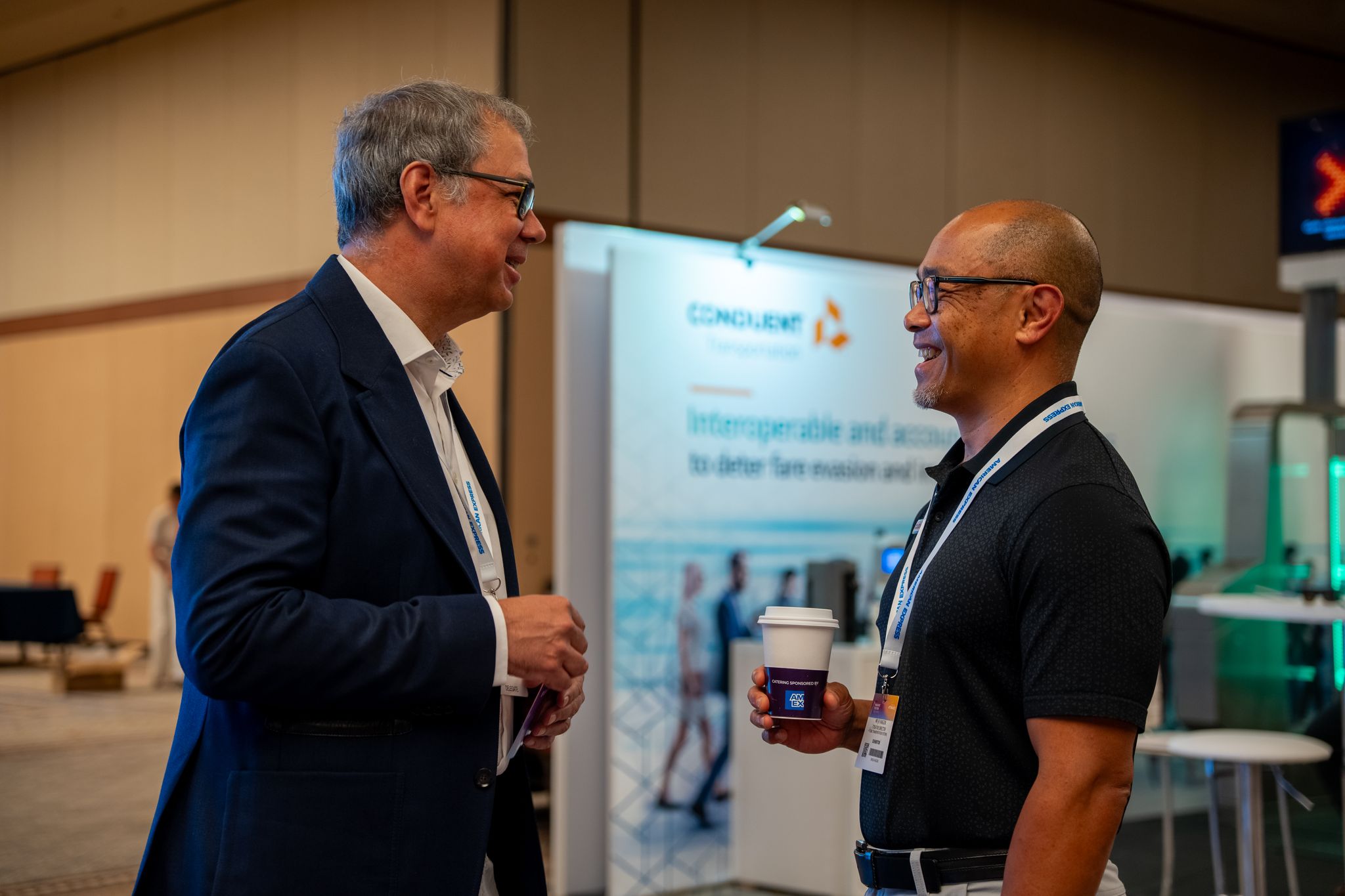 Two men networking on the show floor