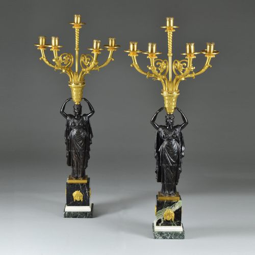 Pair of Roman Patinated and Gilt Bronze Five Light Candelabra