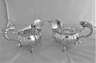 Superb pair crested George II silver sauce or gravy boats London 1753 John Pollock cast Dolphin handles