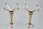 Pair of parcel gilt silver candelabra marked for London 1975 by Stuart Devlin.