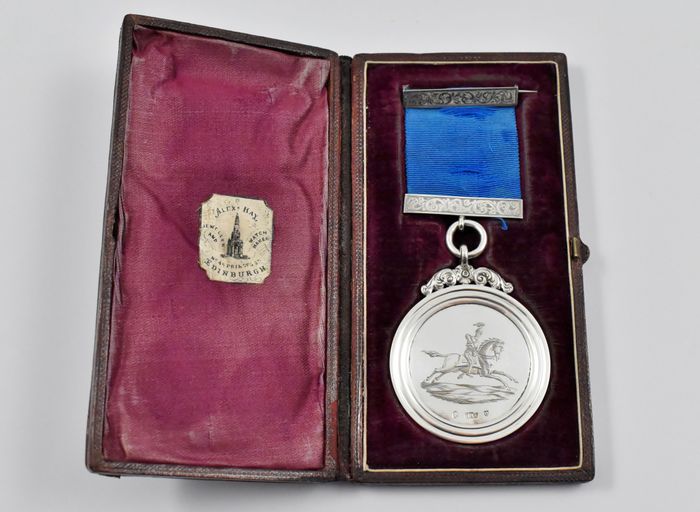 A cased Scottish silver swordsmanship medal by Alex Hay, Jeweller and Watch maker, No 45 Princes St, Edinburgh. Circa 1875.