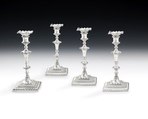 A set of four early George III Candlesticks made in London in 1767 by Ebenezer Coker