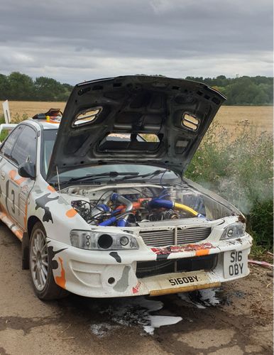 Rally Car Saved From Oil Fire