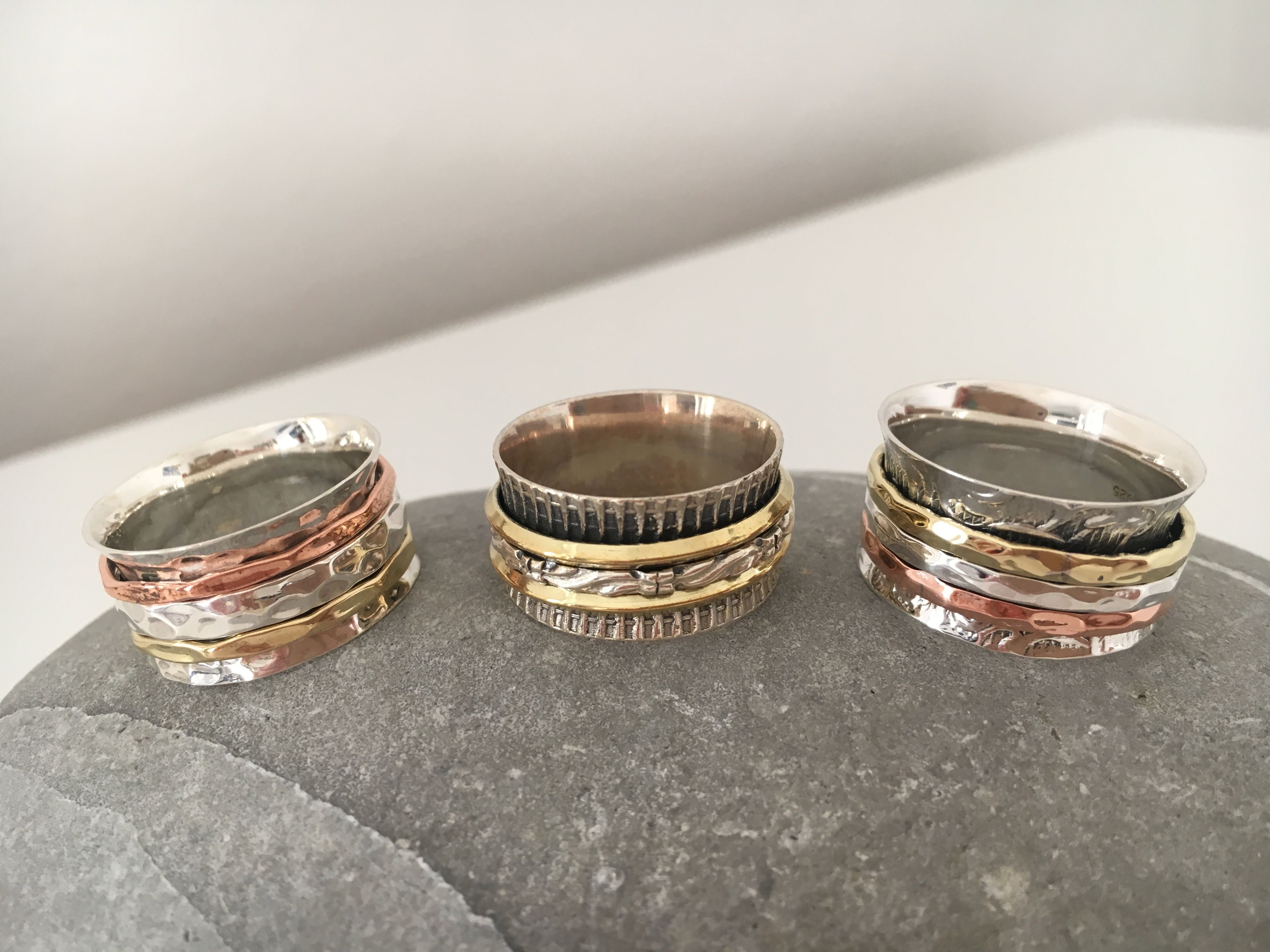Spin Rings in Silver, Copper and Brass
