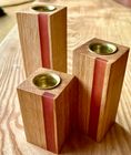 Trio of english hardwood candlesticks