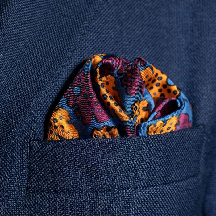 'Motif' in blue, burgundy & gold